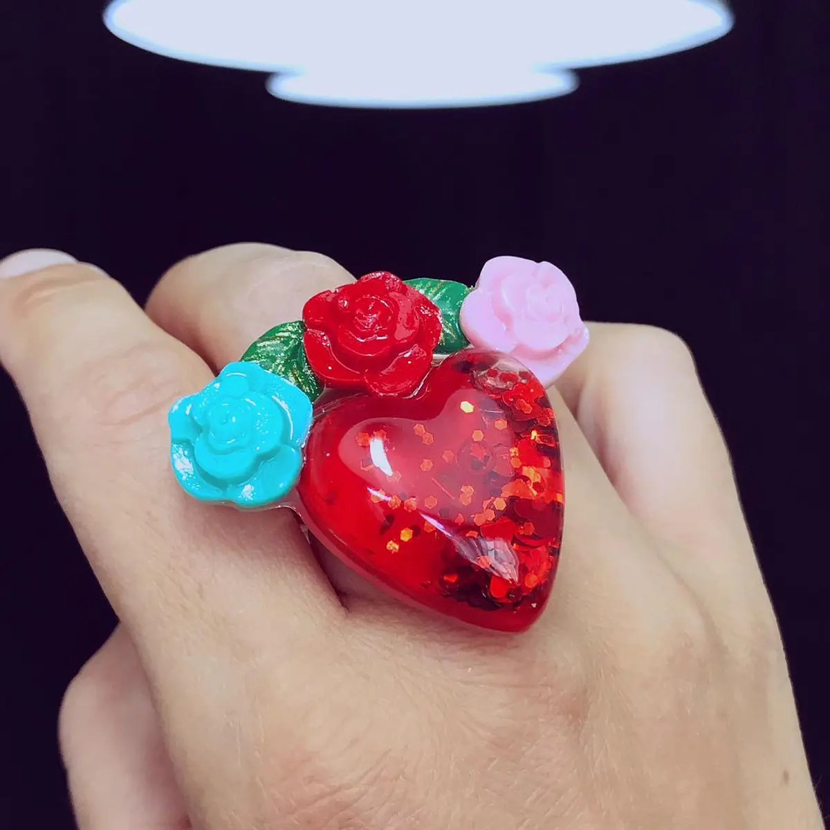 Anillo Corazón en movimiento y corona de flores