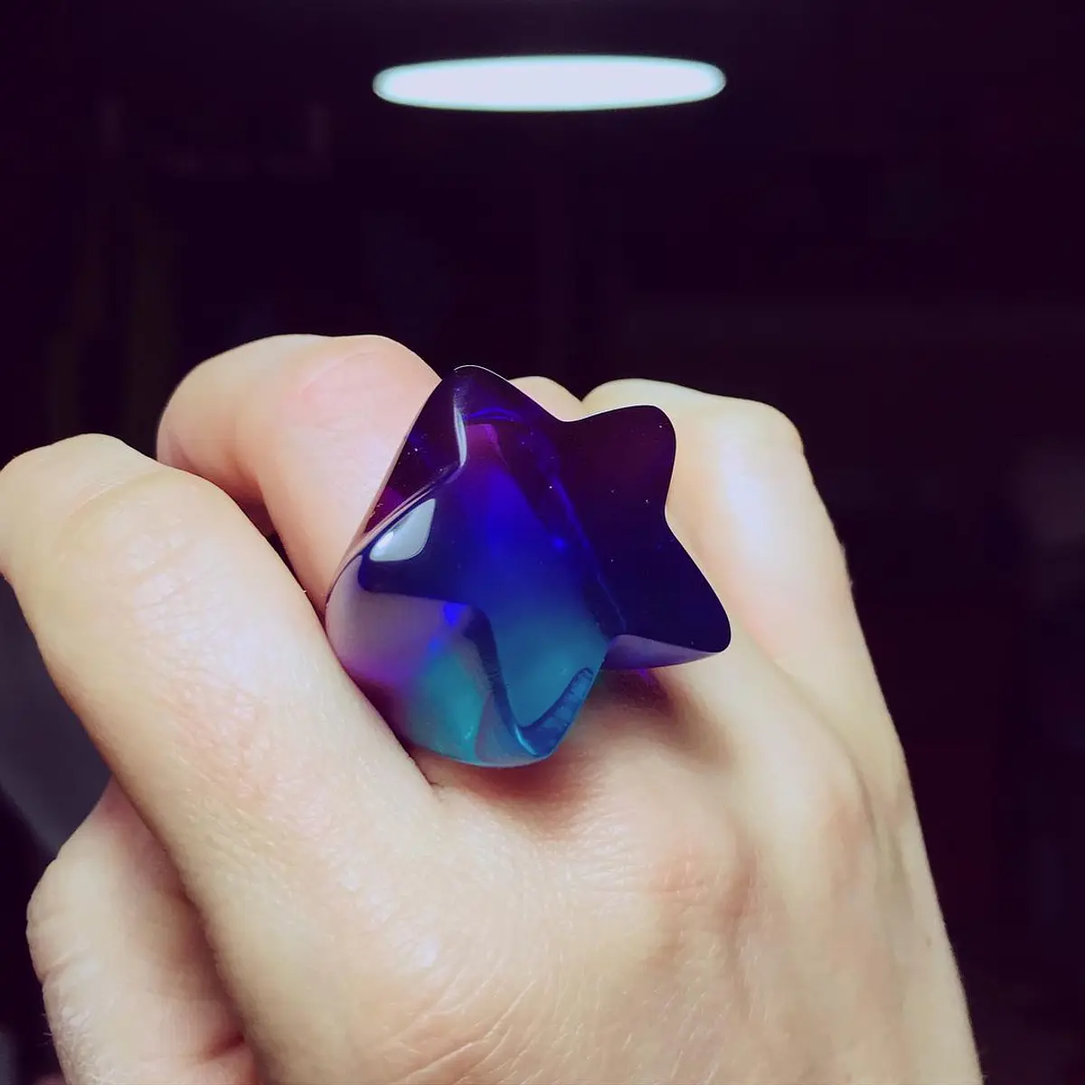 Anillo estrella dúo tono turquesa y violeta