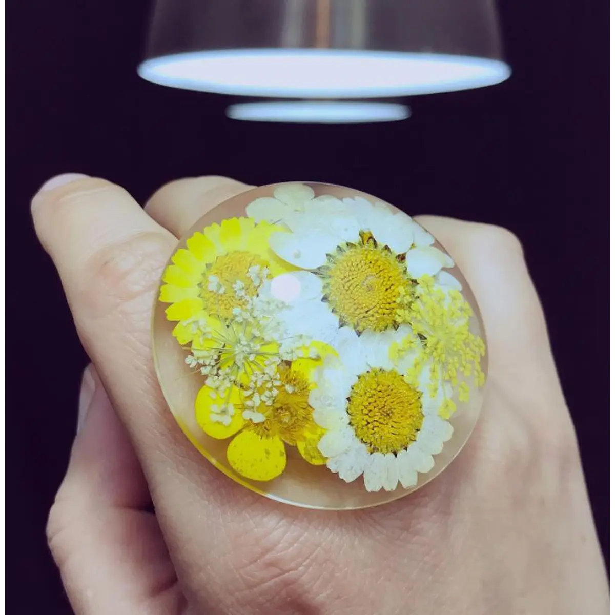 Anillo Nero flores amarillas