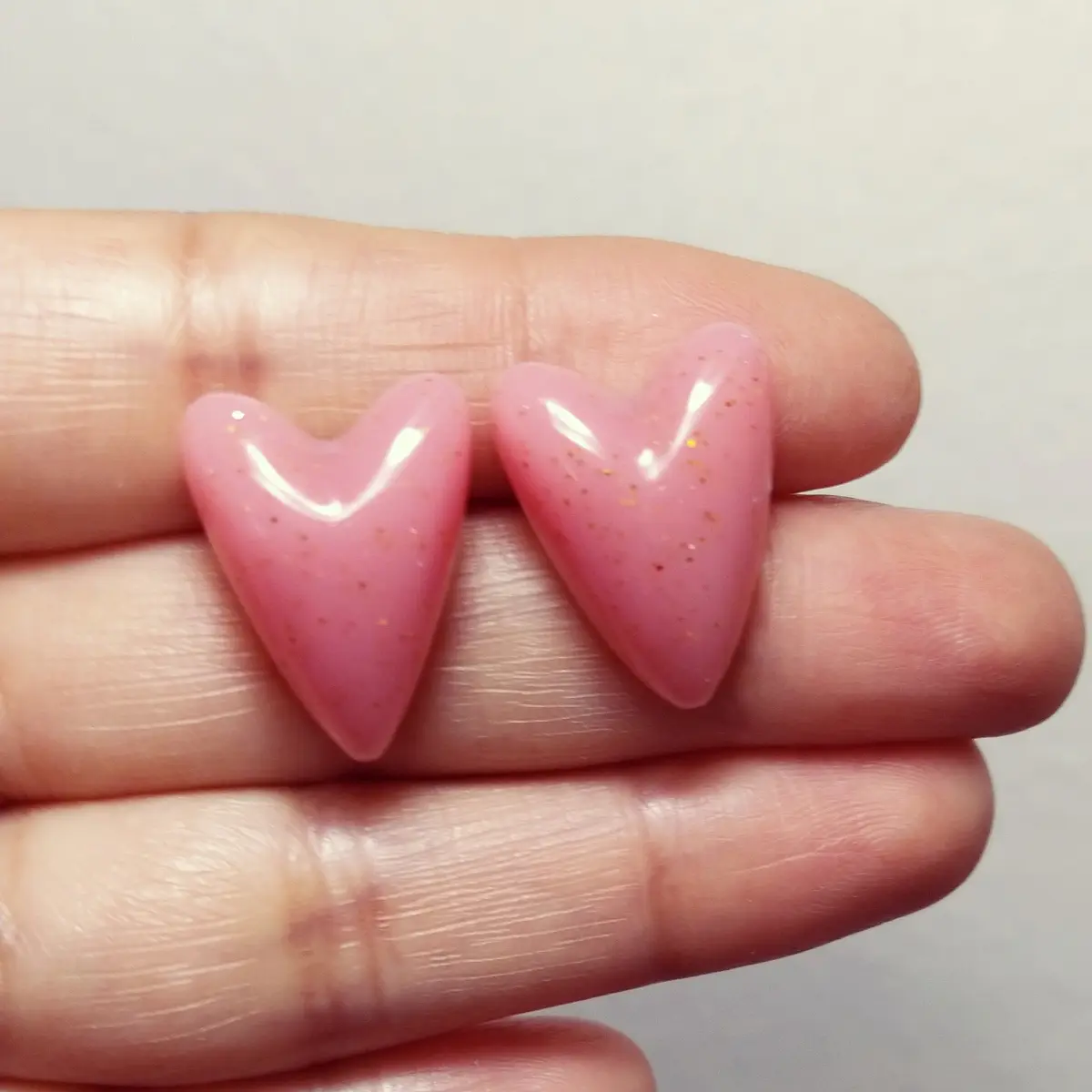 Aritos corazones rosas brillos dorados STOCK