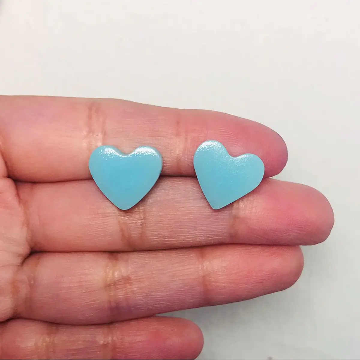 Aritos corazones xs celestes STOCK