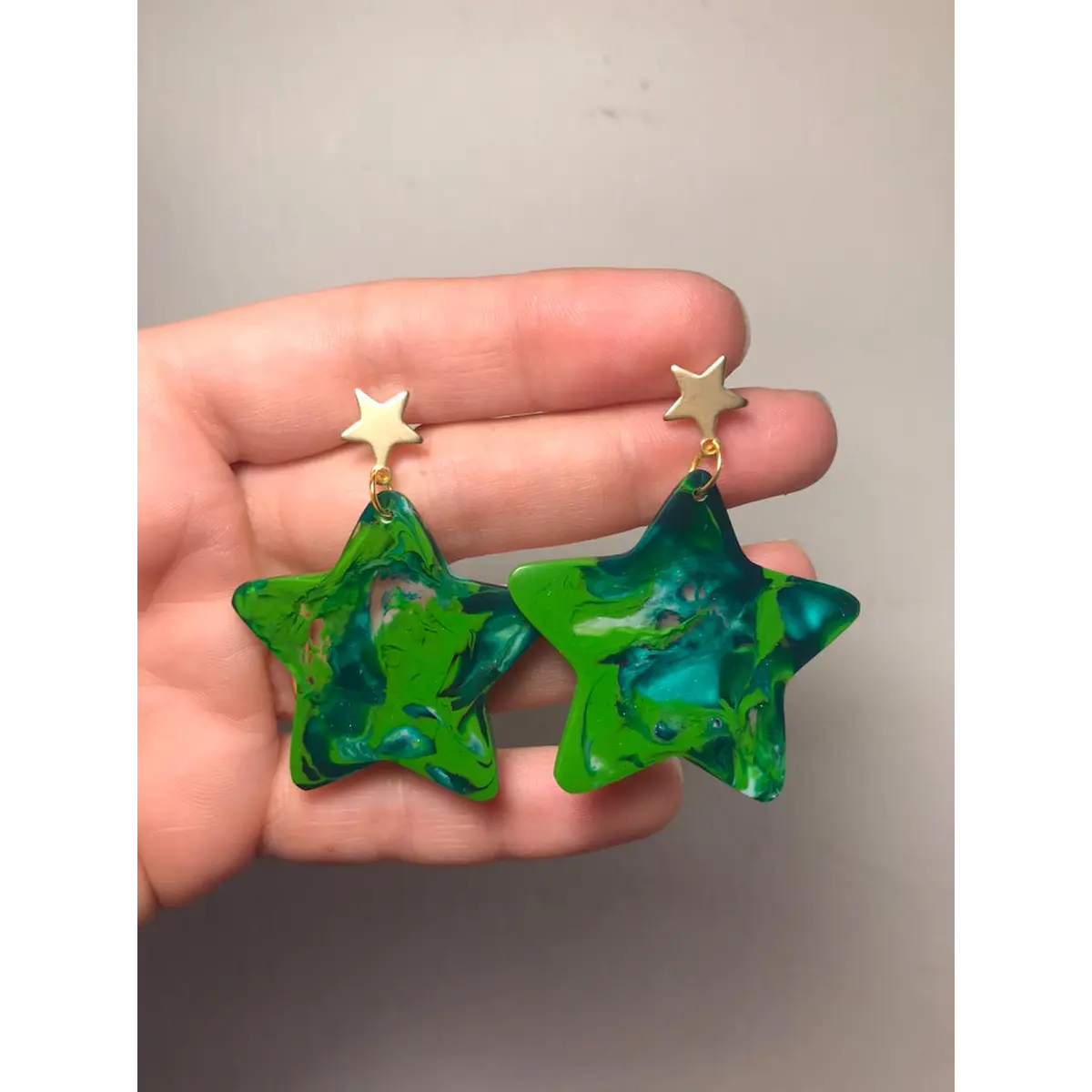 Aros estrellas marmolados translúcidos