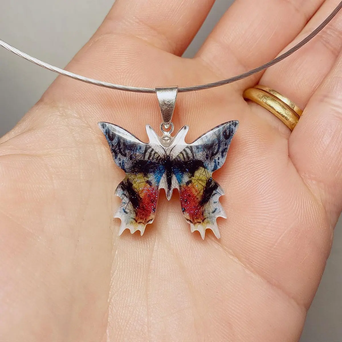 Colgante mariposa tesoro