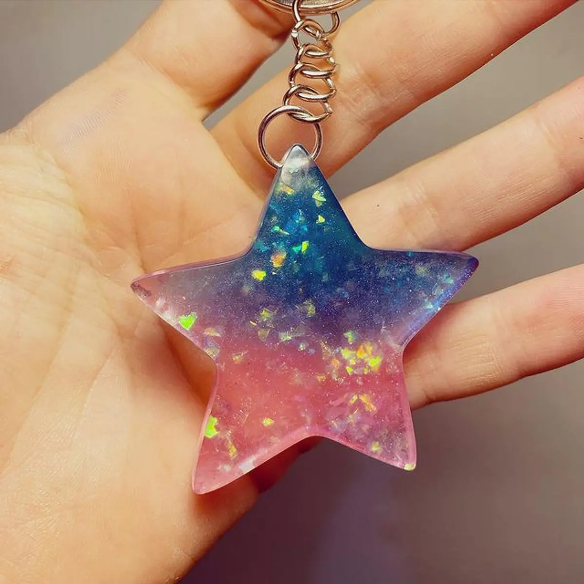 Llavero estrella duo tono tesoro