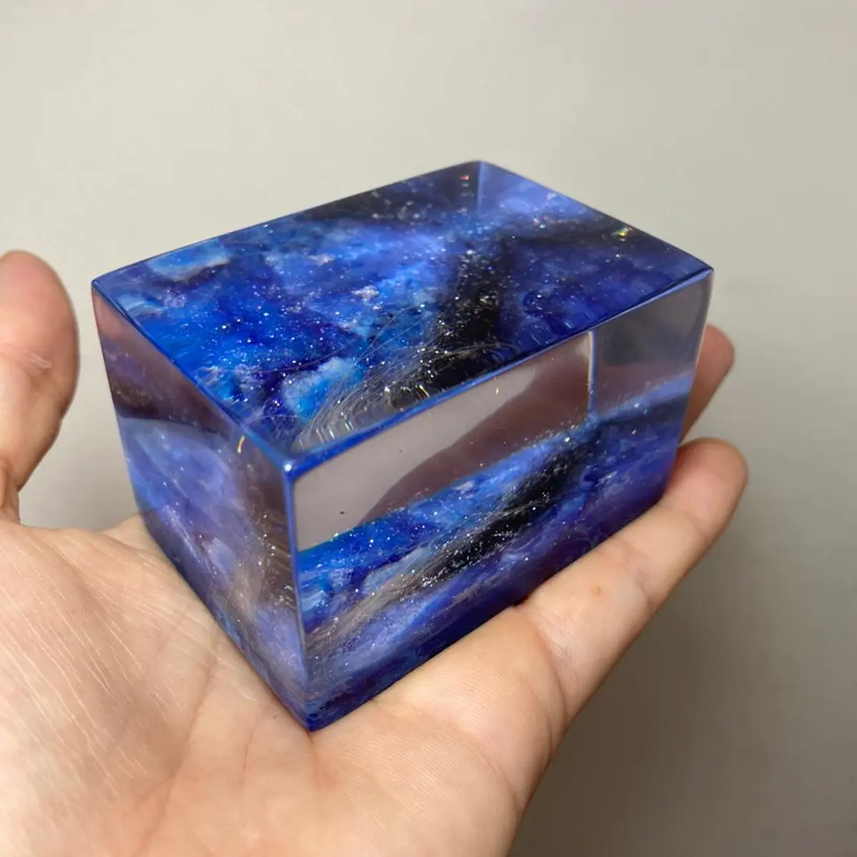 Pisapapeles cubo galaxia y pelitos